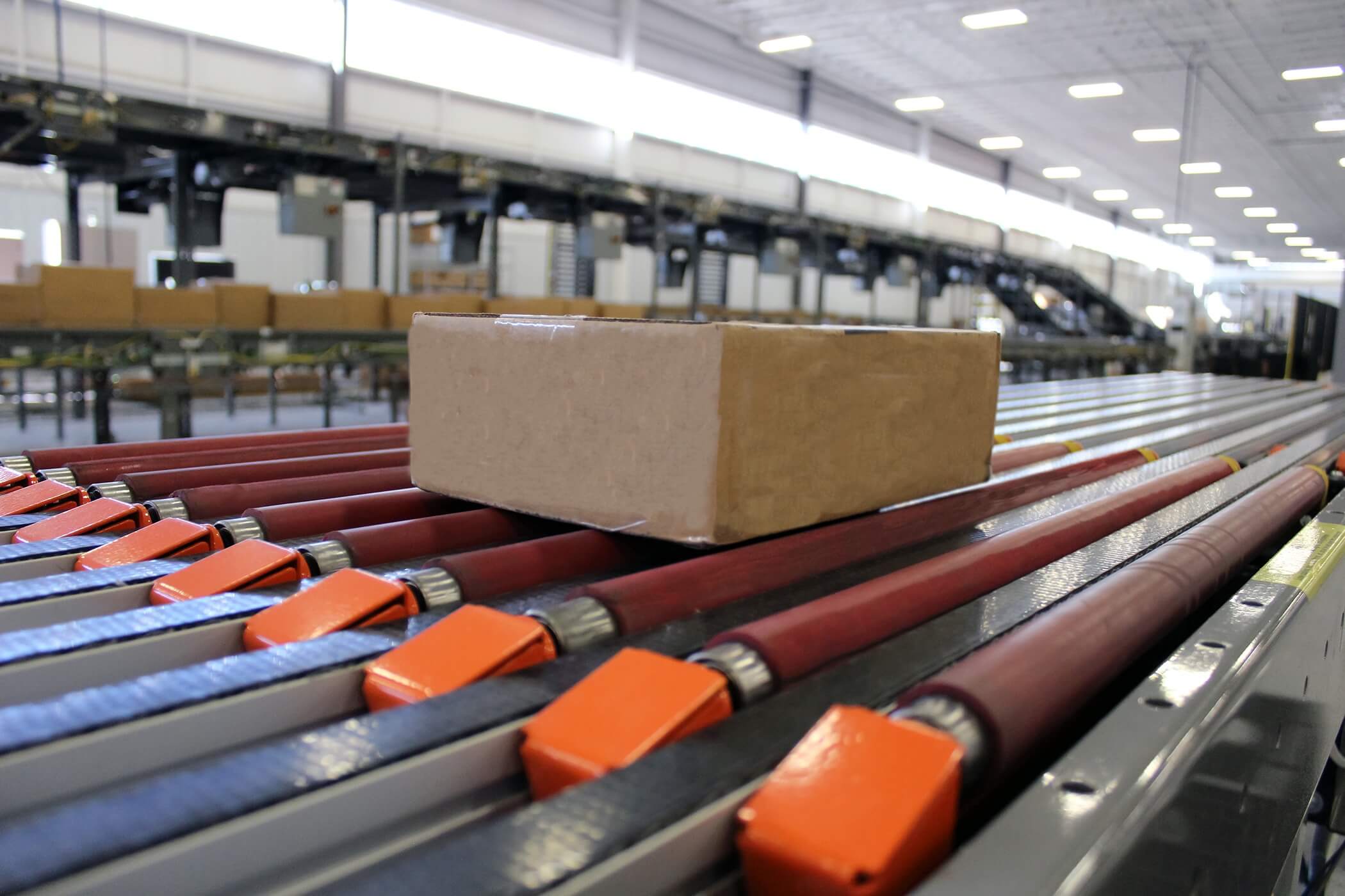 close up view of parcel on shipping system conveyor