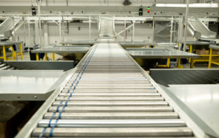 material handling system integration conveyor close up
