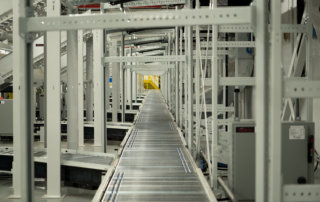 fulfillment center for Levi Strauss Toronto material handling system integration conveyor close up