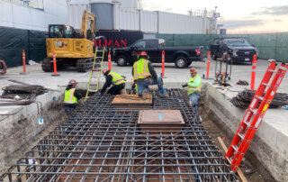 concrete construction on the tarmac at municipal airport