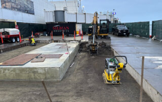 concrete construction on the tarmac at municipal airport