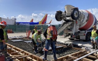 concrete construction on the tarmac at municipal airport