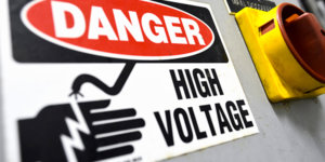 controlling hazardous energy, high voltage sign on industrial equipment