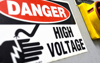 controlling hazardous energy, high voltage sign on industrial equipment