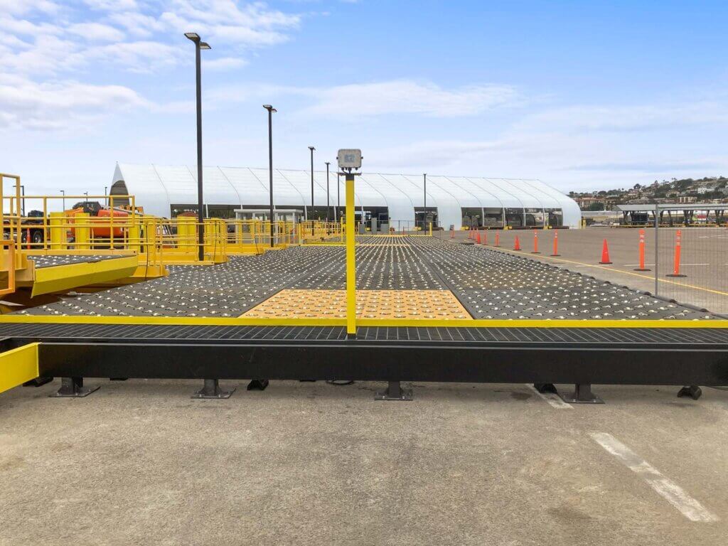 Caster Deck with inline scales at air cargo terminal