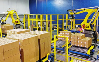two robot cells in an automated palletizing system