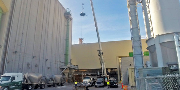crane lifting fabricated industrial equipment