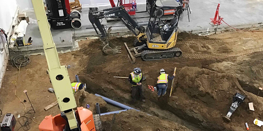 civil team at work during a facility improvement project at a dairy facility