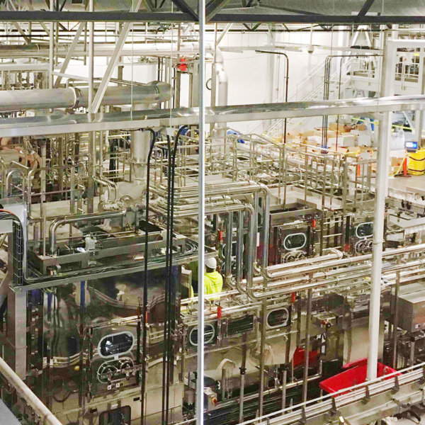 mechanical electrical team in beverage manufacturing facility