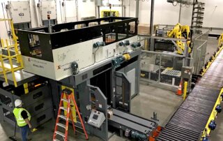 intelligrated palletizer in beverage production facility