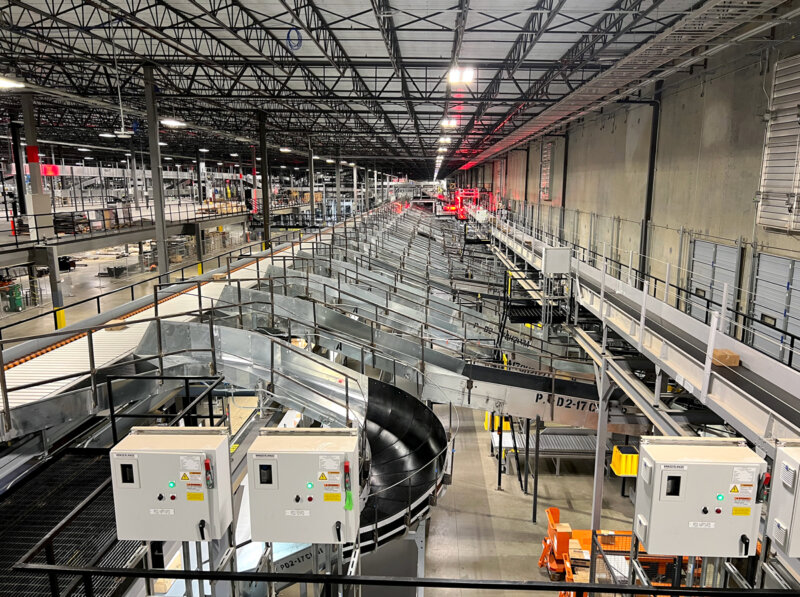 project management of large scale material handling conveyor and controls in parcel handling facility