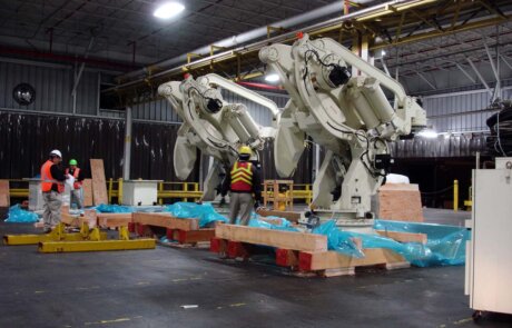 trade teams prepare industrial equipment transport and relocation