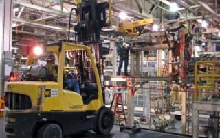 skilled trade teams decommissioning and dismantling auto manufacturing system