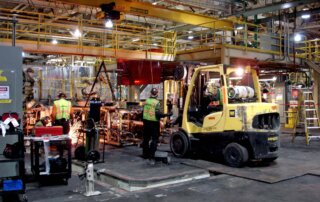 skilled trade teams decommissioning and dismantling auto manufacturing system
