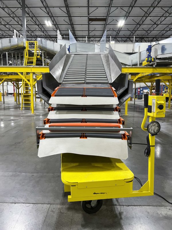 induction station for parcel handling system, conveyor design ontrac lasership