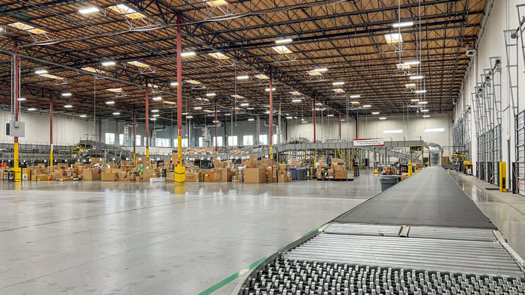 parcel handling system and van line at a delivery center