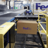 fed ex conveyor and boxes