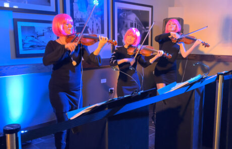 musicians performing at a trade show conference event